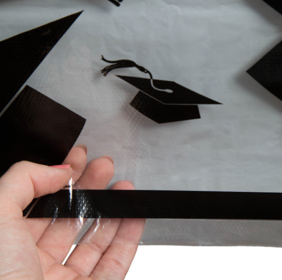 Graduation Caps Rectangular Plastic Table Cover (54" x 108")